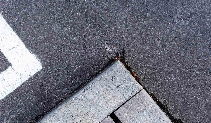 Repair Cracks Between Asphalt Driveway and Concrete