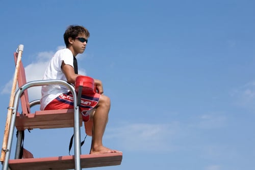 Teenager Sitting Life Guard