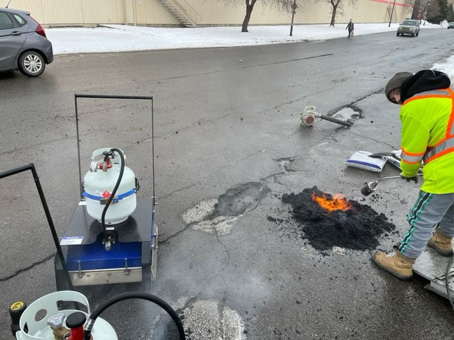 A RY2X2 asphalt repair equipment heating the distressed asphalt